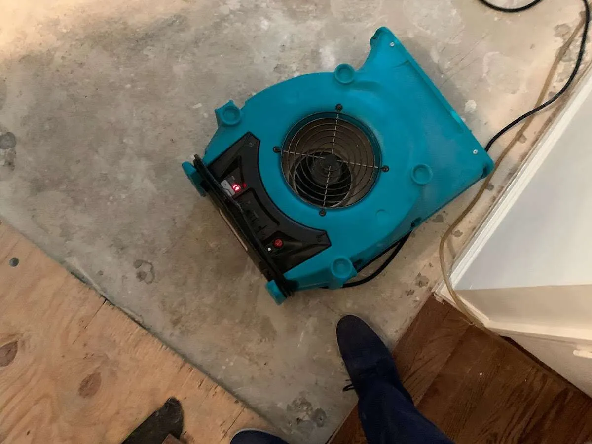 Air mover drying subfloor during Leak Detection & Repair in Azle